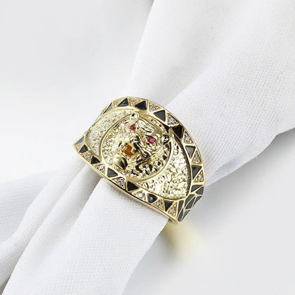 Gold tiger ring with store ruby eyes